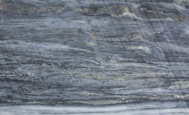 Doğal bir taş. İşlenmemiş mermer. Doku. Arka plan