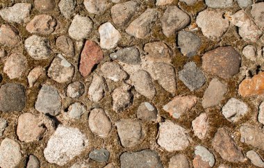 Taş asfaltın dokusu. Çakıl taşlarının arka planı
