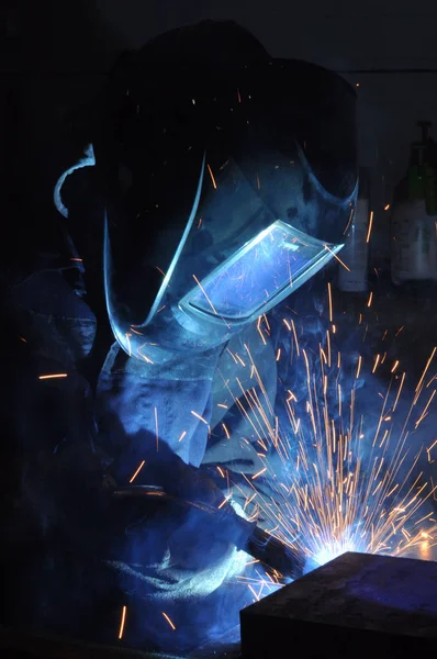 electric welder brews steel at the factory