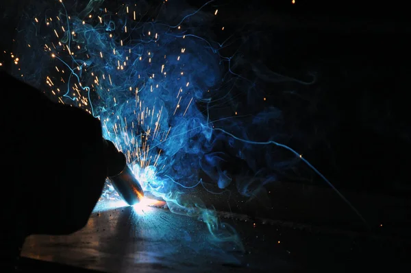 Welding in a car factory with sparks. — Stock Photo, Image