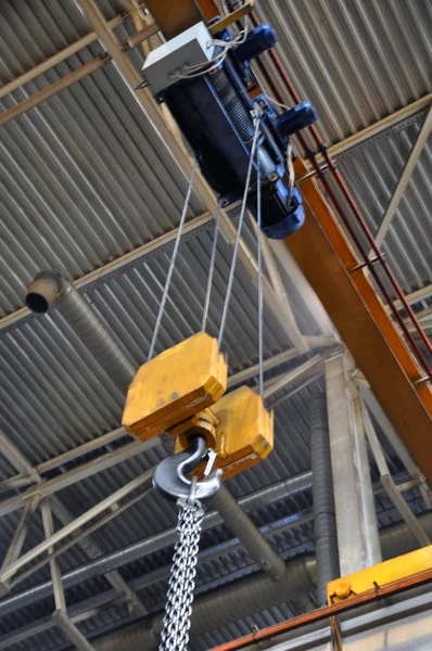 Metallic industrial hook for lifting heavy thing in the factory — Stock Photo, Image