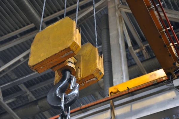 Metallic industrial hook for lifting heavy thing in the factory — Stock Photo, Image