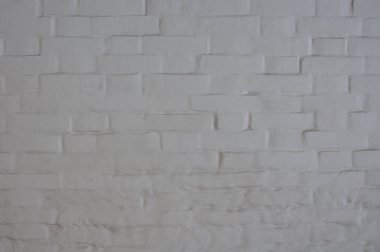 Boya ile kaplı antika beyaz tuğla duvar.