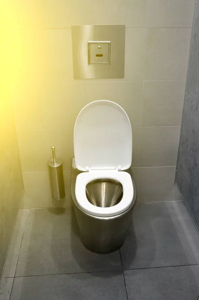 Modern stainless steel toilet in the toilet room. — Stock Photo, Image