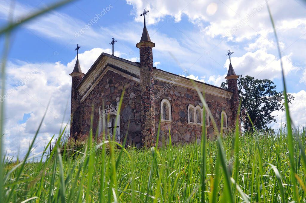 Kossovo, Belarus - July 15, 2020: Neo-Gothic style chapel in an old Catholic cemetery. Kossovo, Belarus