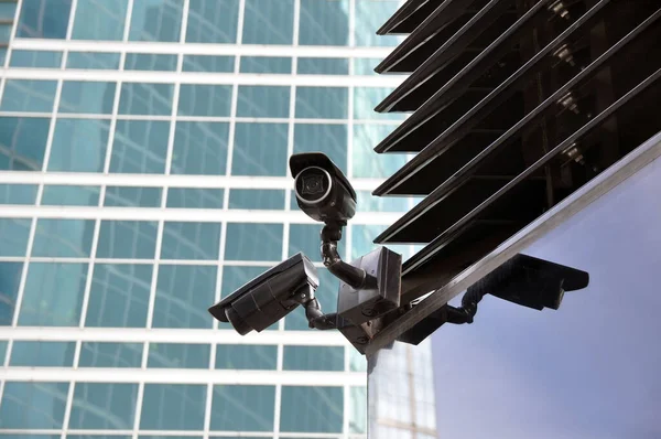 Security cameras in the structure of a modern city. CCTV