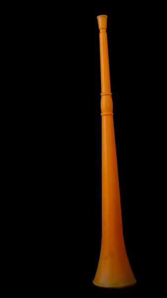 Ένα Πορτοκαλί Χρωματιστό Vuvuzela Απομονώνεται Ενάντια Ένα Μαύρο Φόντο Εικόνα — Φωτογραφία Αρχείου