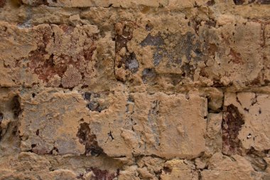 Çiğ tuğla ve çamur boyanmamış yüzey görüntü arka plan kullanım için kopya alanı ile alçı