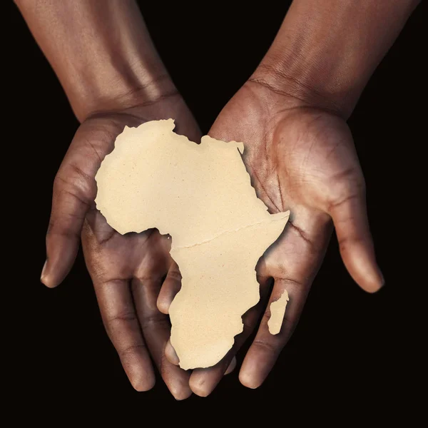 The black hands of an African man holding an African map in the palm of his hands, 3D illustration
