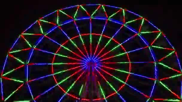 Time-lapse van kleurrijke reuzenrad bij nacht. — Stockvideo