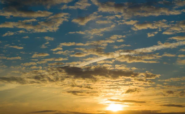 Beautiful golden sunset, sun over horizon.