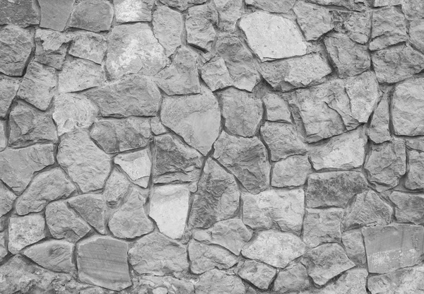 Šedou kamennou zdí. Stone brick wall jako pozadí. — Stock fotografie