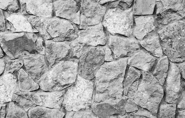 Graue Steinmauer Hintergrund. Natursteinmauer. — Stockfoto