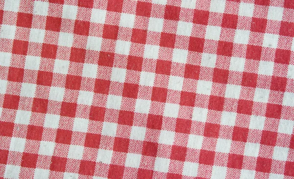 Röd linne rutig bordsduk. Röd och vit konsistens. — Stockfoto