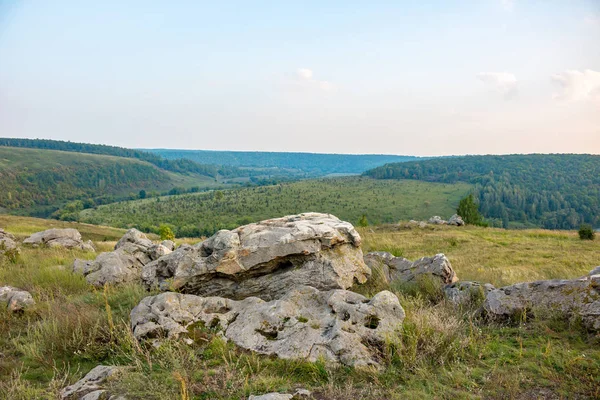 Sacred stones in the area of the village of Krasnogorye. The nature monument Witches stones. The valley of the Krasivaya Mecha River. Tula region, Russia