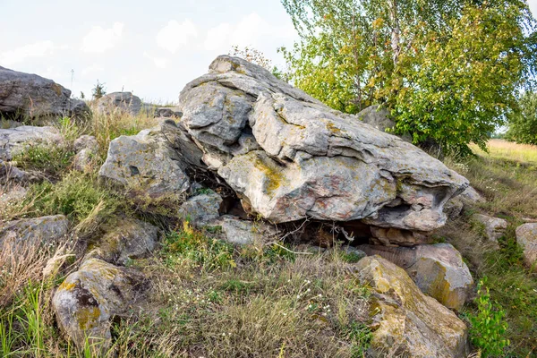 Sacred stones in the area of the village of Krasnogorye. The nature monument Witches stones. The valley of the Krasivaya Mecha River. Tula region, Russia