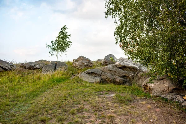 Sacred stones in the area of the village of Krasnogorye. The nature monument Witches stones. The valley of the Krasivaya Mecha River. Tula region, Russia