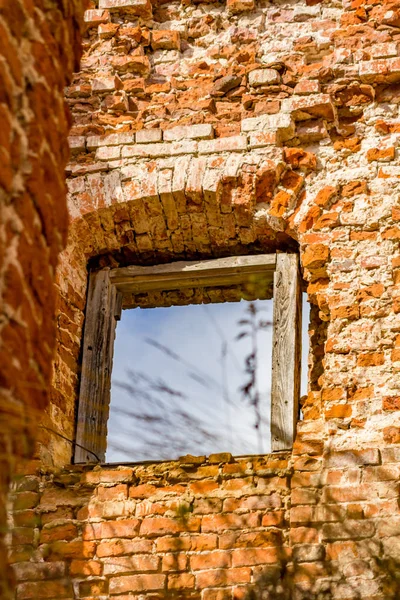 Windows in the old abandoned manor house of the 18th century. Belkino Manor, Russia