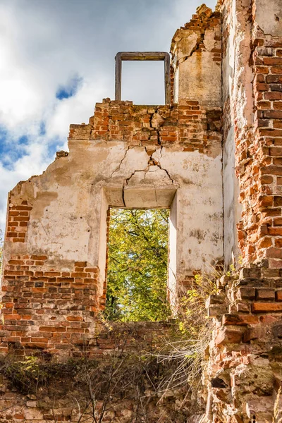 The walls of an old abandoned manor house of the 18th century, a view from inside. Belkino Manor, Russia