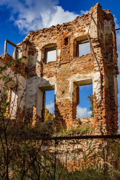 The walls of an old abandoned manor house of the 18th century, a view from inside. Belkino Manor, Russia
