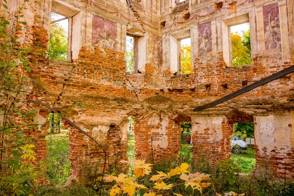 Frescoes on the walls of an old abandoned manor house of the 18th century, a view from the inside. Belkino Manor, Russia