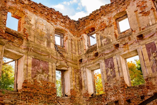 Frescoes on the walls of an old abandoned manor house of the 18th century, a view from the inside. Belkino Manor, Russia