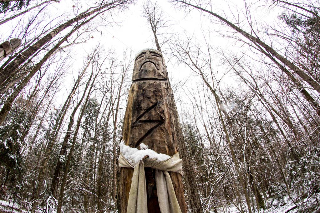 Russia - November 2015: Perun - Slavic pagan idol on the forest temple. Kaluzhskiy region