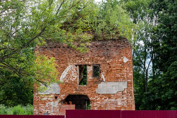 Ruins of the Church of St. Nicholas the Wonderworker in the village of Avchurino. Ferzikovsky District, Kaluzhskiy region, Russia - July 2019