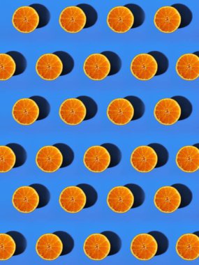 mavi arka plan ile portakal bir dilim bir desen