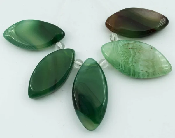 Natural green agate on white background