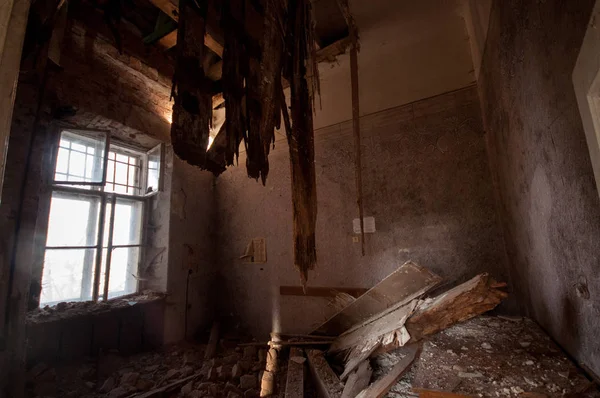 Old abandoned room with windows in the palace