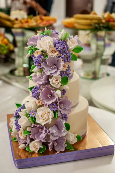 Wedding cake decorated with flowers