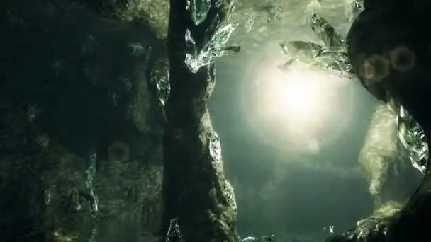 Animation 3D. Lumière magique volant à travers la grotte avec beaucoup de cristaux .