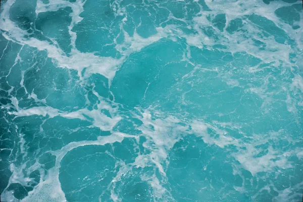 Soyut Mavi deniz suyu için arka plan beyaz köpük ile