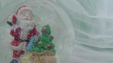 Noel metin için arka plan. Noel arka plan için tebrikler. Santa Claus figürin