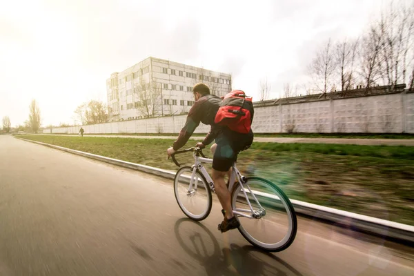 Cyclist Ride His Bike Bag Sunset Background — Stock Photo, Image