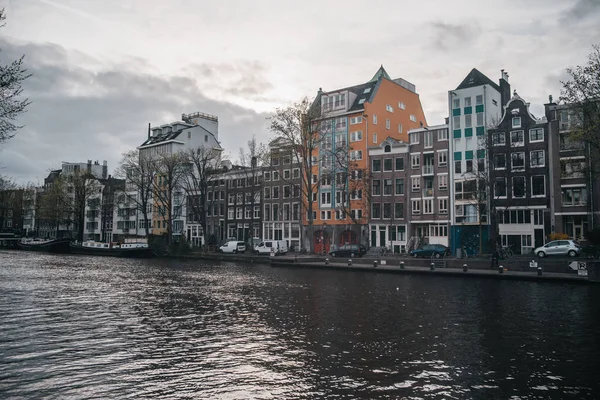 Cozy european architecture with river canal. Amsterdam beautiful