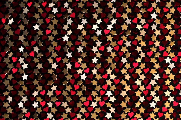 Repeating golden stars and red hearts on black background. Backdrop for Valentine Day or romantic, festive event. 3d illustration.