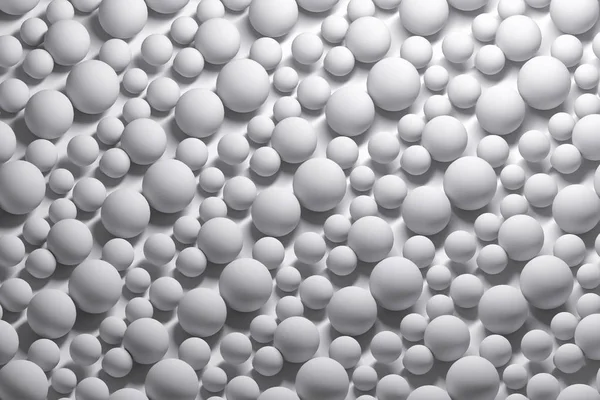 Repeating white balls spheres pattern of various sizes. 3d illustration.