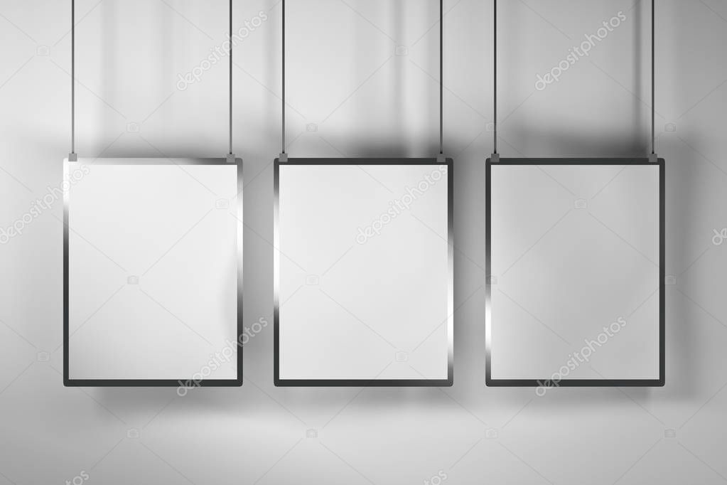 Three white empty posters, boards hanging over the white wall. Branding mock up. Blank copy space for text. 3D illustration.