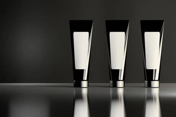 Tres Tubos Cosméticos Negros Brillantes Similares Con Etiquetas Blancas Paradas — Foto de Stock