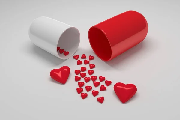 多くの小さな心を持つ赤い白い丸薬のカプセル — ストック写真
