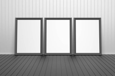 Bir odada üç resim çerçevesi