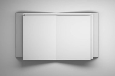 Beyaz masa üzerine katlanmış kağıt levhalar