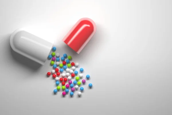One opened medical pill capsule with colorful spherical drug particles spilled on surface. 3d illustration.