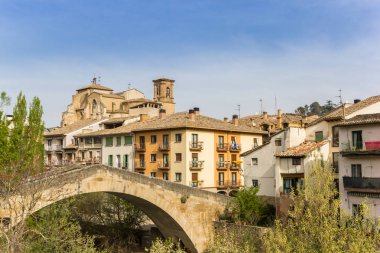 Old roman bridge in the historic city of Estella, Spain clipart