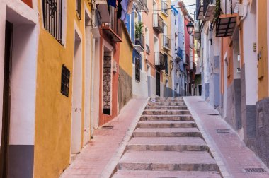 Colorful street in the historic center of Villajoyosa, Spain clipart