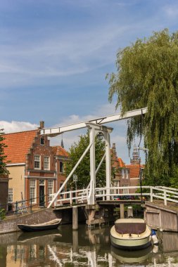 Small wooden bridge over a canal in Monnickendam, Netherlands clipart