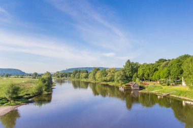 River Weser and old wooden mill near Minden, Germany clipart