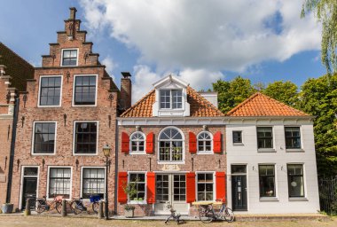 Old houses at the cheese market sqaure in Edam, Netherlands clipart